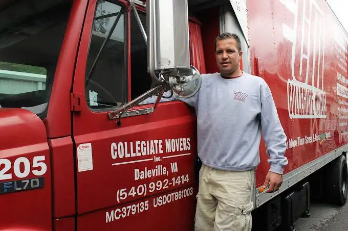 Truck door of long distance movers Collegiate Movers showing its USDOT number