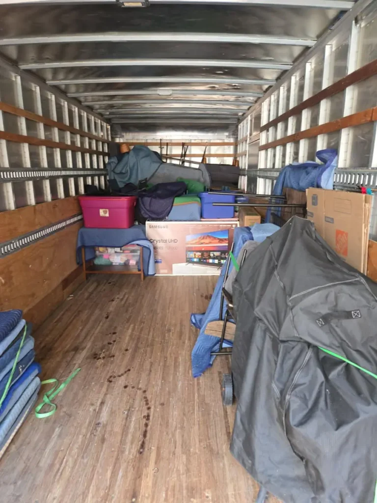 Furniture protected with moving pads inside a truck
